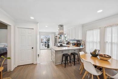 Welcome to this bright and airy two-bedroom, one-bath home which - photo 8