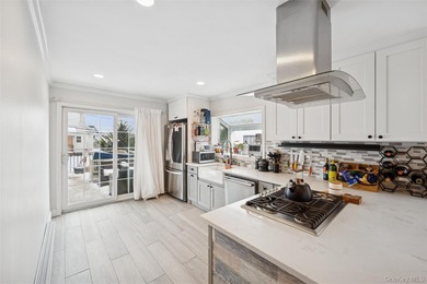 Welcome to this bright and airy two-bedroom, one-bath home which - photo 9