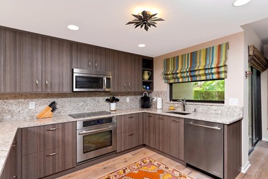Welcome to this charming two-bedroom, two-bathroom condominium - photo 9