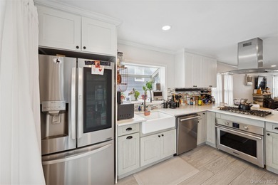 Welcome to this bright and airy two-bedroom, one-bath home which - photo 10
