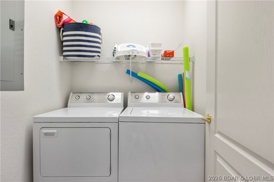 Turnkey lakefront condo at Monarch Cove offering beautiful views