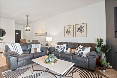 Turnkey lakefront condo at Monarch Cove offering beautiful views