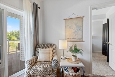 Turnkey lakefront condo at Monarch Cove offering beautiful views