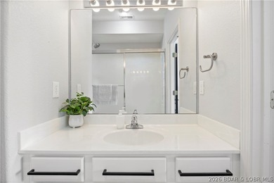 Turnkey lakefront condo at Monarch Cove offering beautiful views