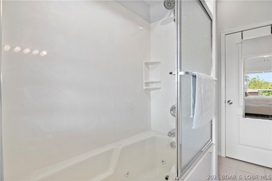 Turnkey lakefront condo at Monarch Cove offering beautiful views