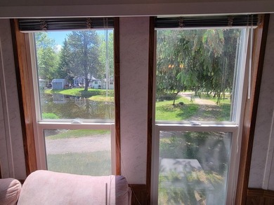 WATER VIEWS FROM YOUR LIVING ROOM! Unusual park model; the - photo 4
