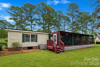 Nestled on a breathtaking 1.29-acre lakefront lot, this - photo 14
