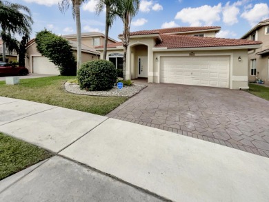 Lake Home For Sale in Coconut Creek, Florida