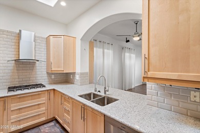 Welcome to this beautifully updated desert oasis featuring new