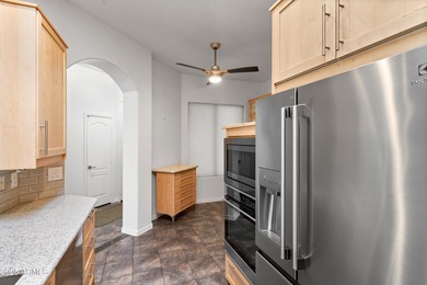 Welcome to this beautifully updated desert oasis featuring new