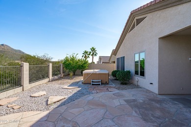 Welcome to this beautifully updated desert oasis featuring new
