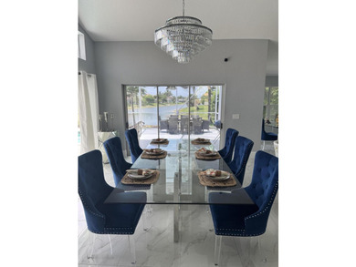Welcome to this charming four-bedroom, three-bathroom - photo 7