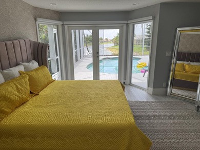 Welcome to this charming four-bedroom, three-bathroom - photo 9