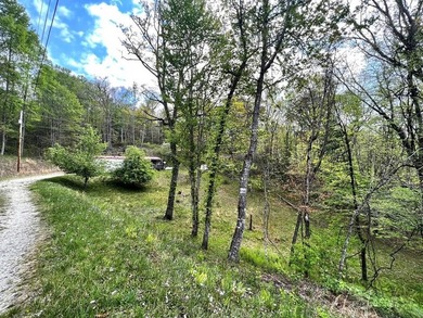 Tucked into a peaceful setting, this home invites you to slow - photo 1