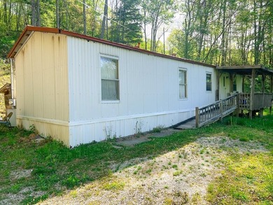 Tucked into a peaceful setting, this home invites you to slow - photo 2
