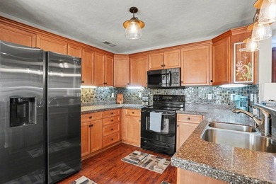 This beautifully maintained home in Highland Woods showcases - photo 12