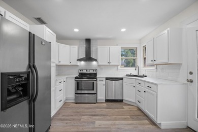 **BRICK HOME**FULLY RENOVATED**FULLY FENCED** Welcome to this - photo 3