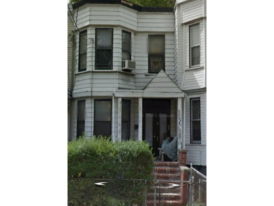 Welcome to this attached single-family home located in the - photo 1