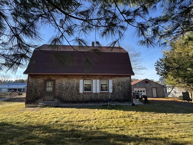 This solid Gambrel home sits on an open, level 1.2-acre lot with