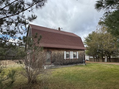 This solid Gambrel home sits on an open, level 1.2-acre lot with
