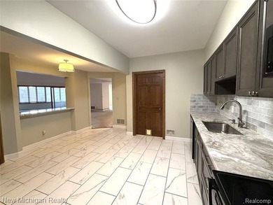 Luxurious updated condo in a resort-style building filled with - photo 12