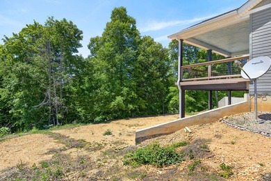 Lake living awaits in this beautiful 2024-built home located - photo 6