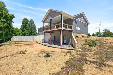 Lake living awaits in this beautiful 2024-built home located - photo 7