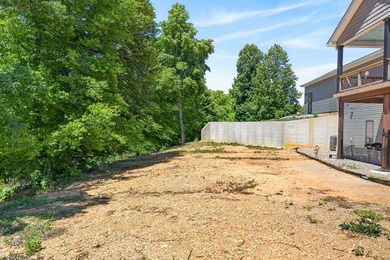 Lake living awaits in this beautiful 2024-built home located - photo 8