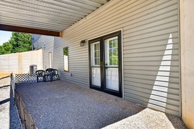 Lake living awaits in this beautiful 2024-built home located - photo 9