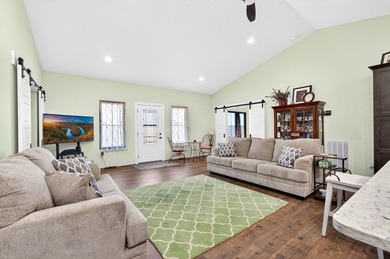 Lake living awaits in this beautiful 2024-built home located - photo 10