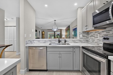 TASTEFULLY UPDATED END-UNIT VILLA WITH A BRAND NEW 2024 ROOF! - photo 6