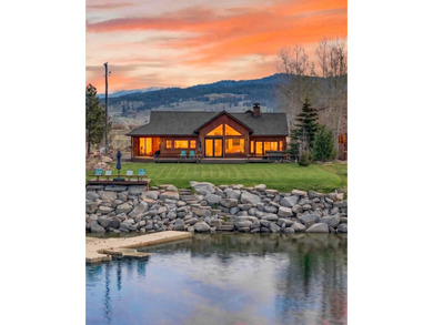 Set on 80 feet of deep-water shoreline along Lake Cascade, this - photo 1