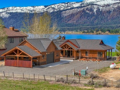Set on 80 feet of deep-water shoreline along Lake Cascade, this - photo 3