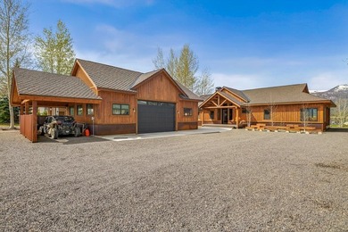Set on 80 feet of deep-water shoreline along Lake Cascade, this - photo 4