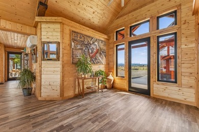 Set on 80 feet of deep-water shoreline along Lake Cascade, this - photo 8
