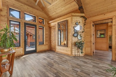 Set on 80 feet of deep-water shoreline along Lake Cascade, this - photo 9