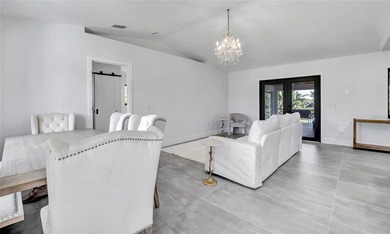 Experience resort-style living in this masterfully renovated - photo 9