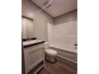 Built in 2025, this brand-new residence offers 3 bedrooms, 2 - photo 10