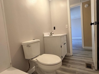 Completely renovated, this 3-bedroom, 2-bathroom home is just 2 - photo 11