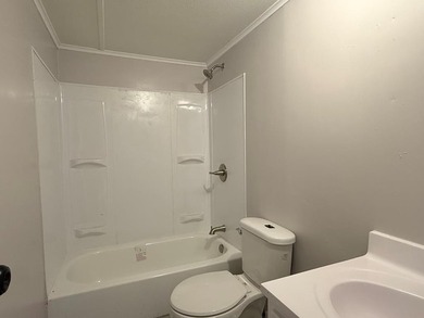 Completely renovated, this 3-bedroom, 2-bathroom home is just 2 - photo 12