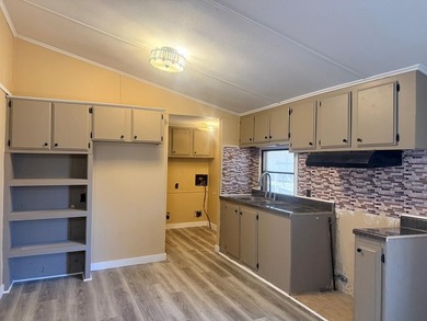 Completely renovated, this 3-bedroom, 2-bathroom home is just 2 - photo 17