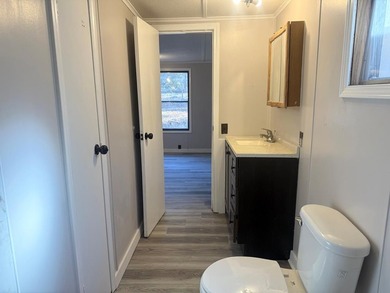 Completely renovated, this 3-bedroom, 2-bathroom home is just 2 - photo 18