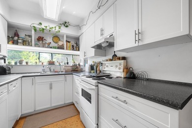 Welcome to Sunset West, a beautifully updated corner residence - photo 10