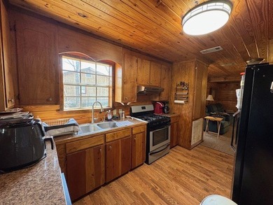 This camp house is a beautiful retreat nestled along the serene - photo 5