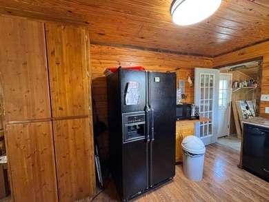 This camp house is a beautiful retreat nestled along the serene - photo 6