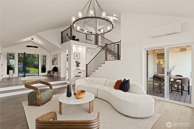 Perched above Lake Washington in one of the Island's most - photo 7