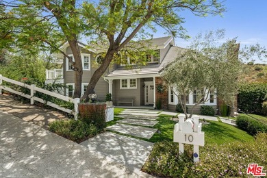Nestled on a sprawling, park-like acre within the prestigious - photo 2