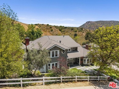 Nestled on a sprawling, park-like acre within the prestigious - photo 3