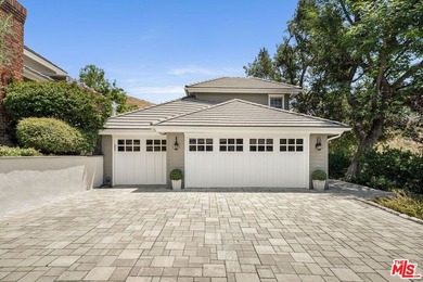 Nestled on a sprawling, park-like acre within the prestigious - photo 4