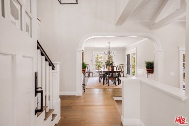 Nestled on a sprawling, park-like acre within the prestigious - photo 6